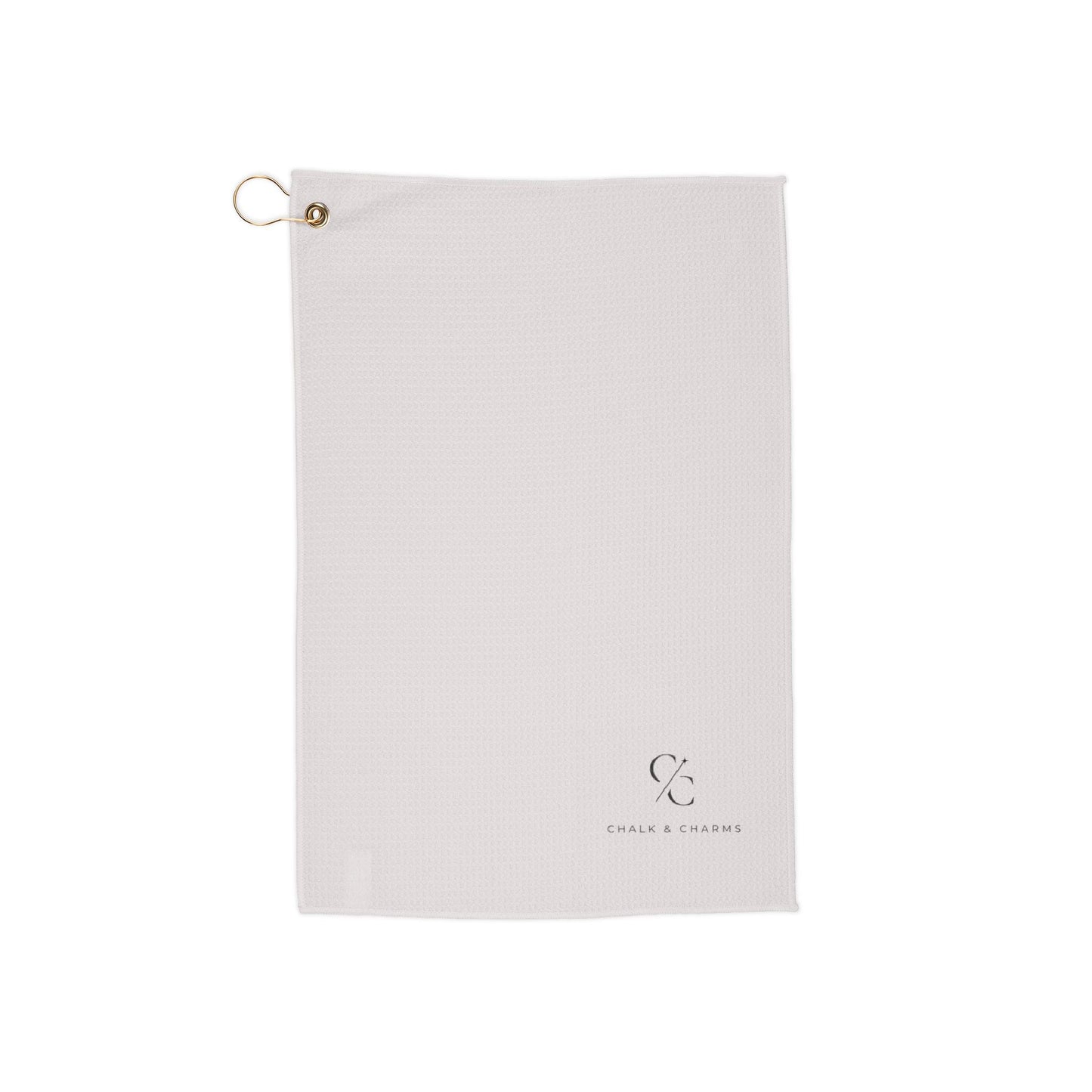 Chalk and Charms ivory billiards towel flat lay on dark walnut surface with gold grommet hook and monogram